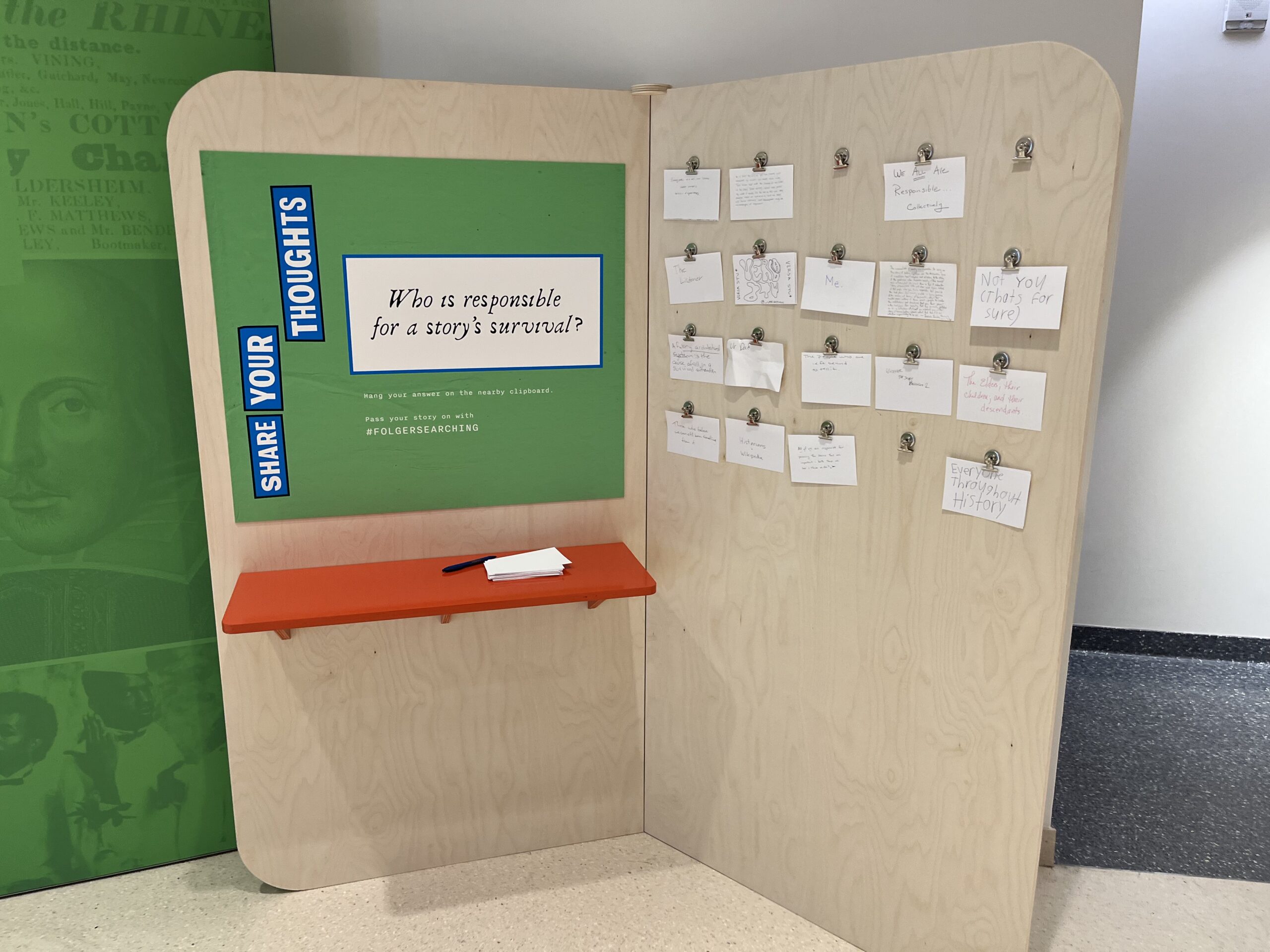 An exhibition talkback station, asking the question "Who is responsible for a story's survival?"
